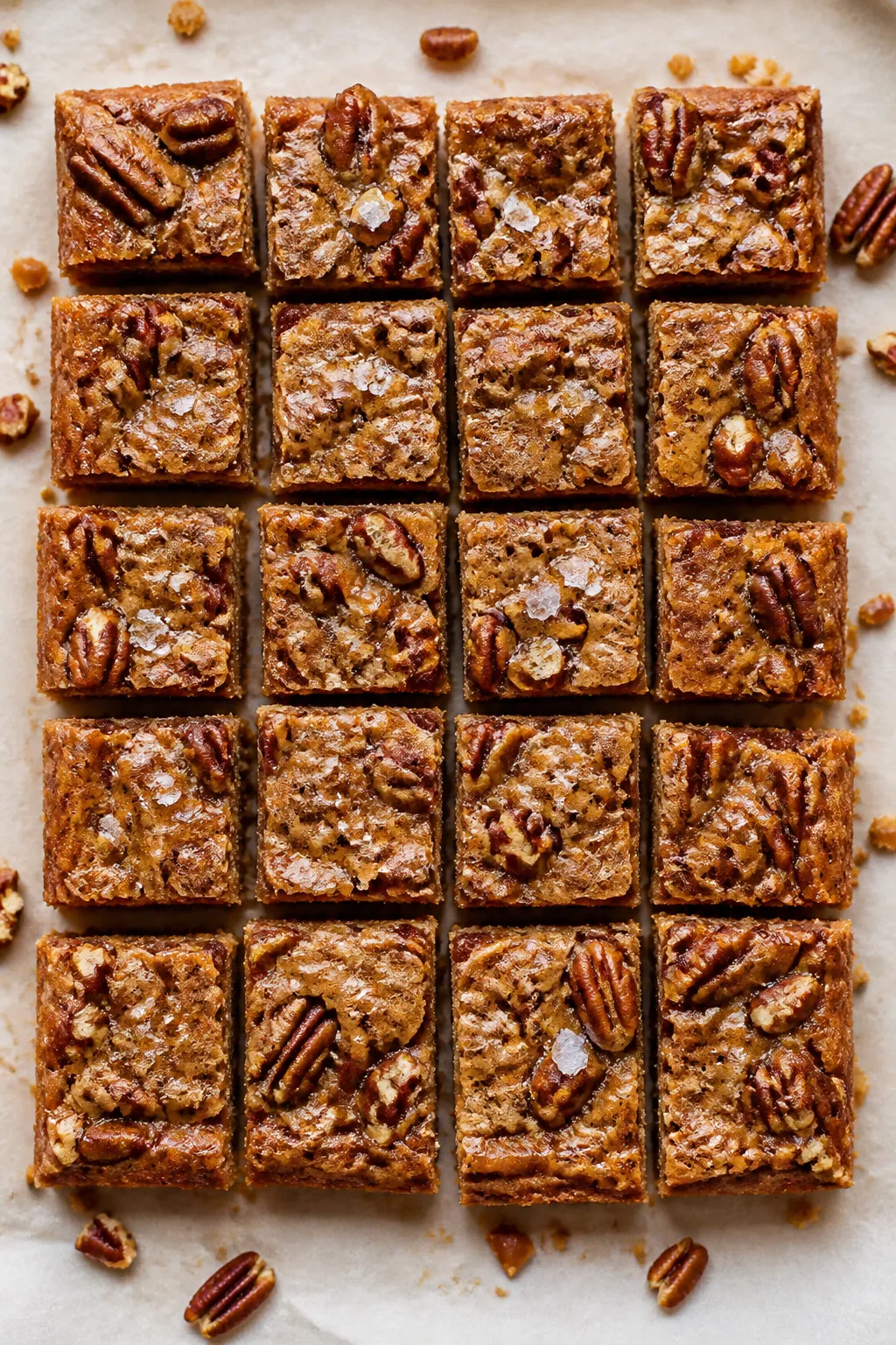 Tasty top view final presentation: Overhead shot of neatly sliced Brown Butter Toffee Pecan Bars arr