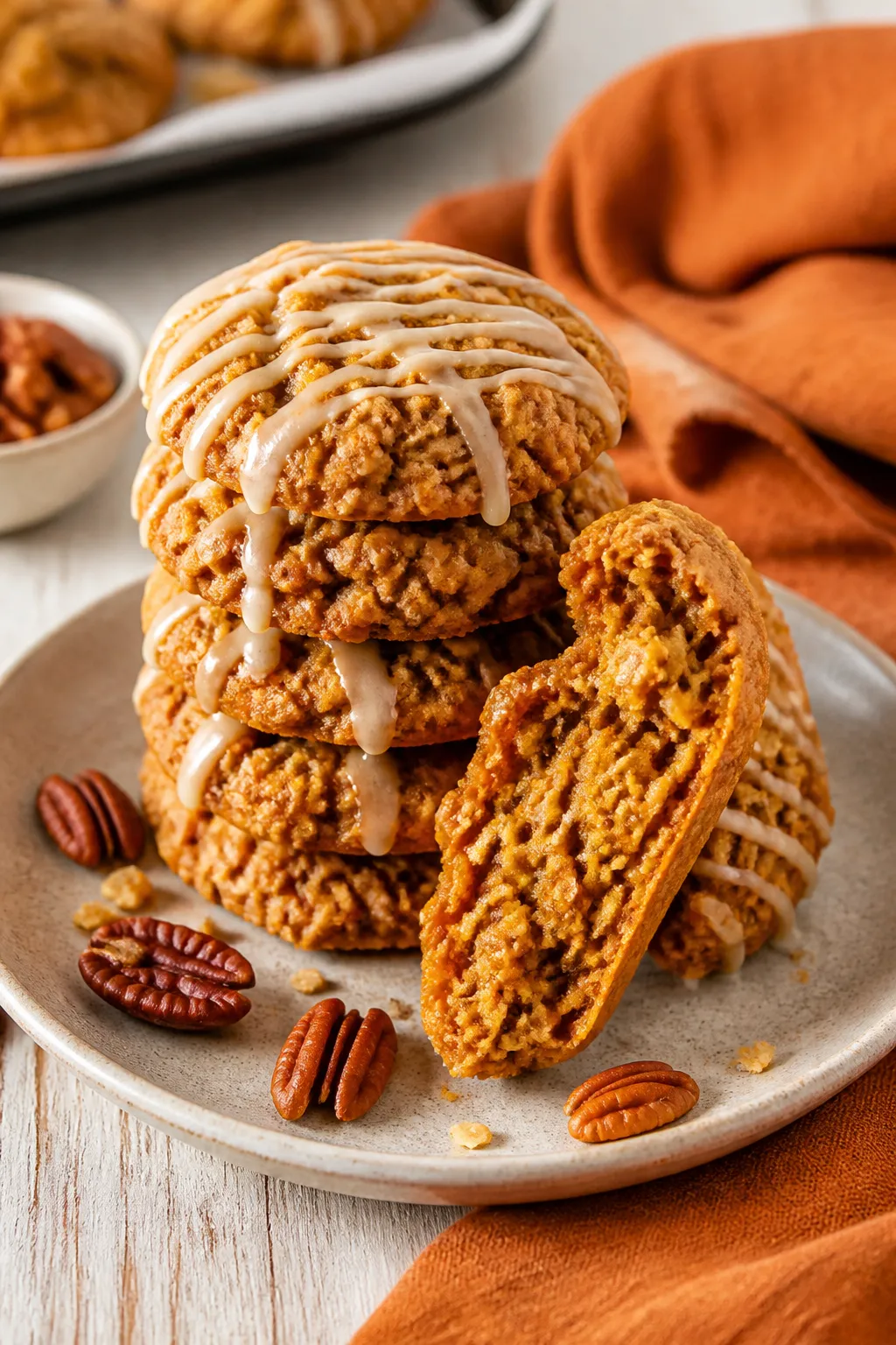 Final presentation shot: a bakery-style stack of Maple Pumpkin Oatmeal Cookies on a matte ceramic pl