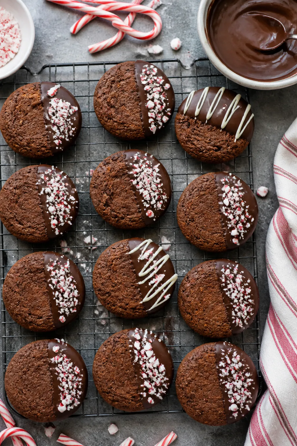 Overhead “tasty top view” of a festive cookie-cooling scene: a wire rack filled with uniformly s