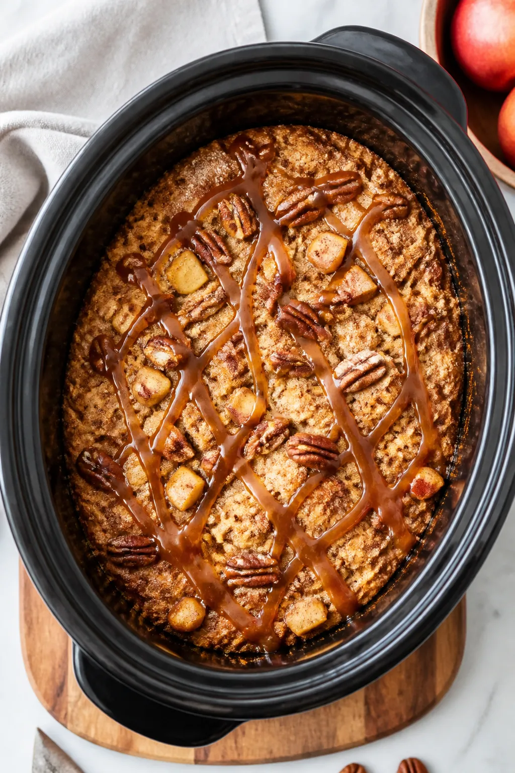 Tasty top view: Overhead shot of the finished bread pudding still in a 6-quart crock insert, evenly